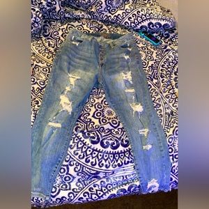 Plus sized woman’s ripped jeans, Hartley ever worn.